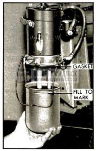 1953 Buick Filling H-L Power Unit Reservoir